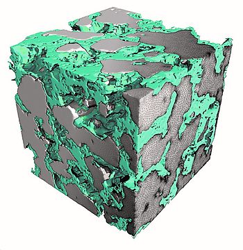 Grauer 3D-Würfel mit grünen Teilen